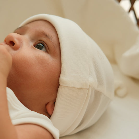 Knotted Hat in Milk