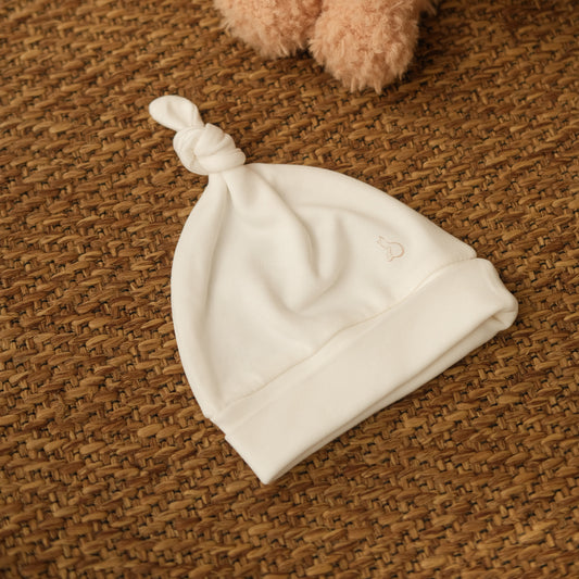 Knotted Hat in Milk